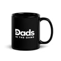 Black Dads in the Game 11 oz ceramic mug with white full logo, handle on the right