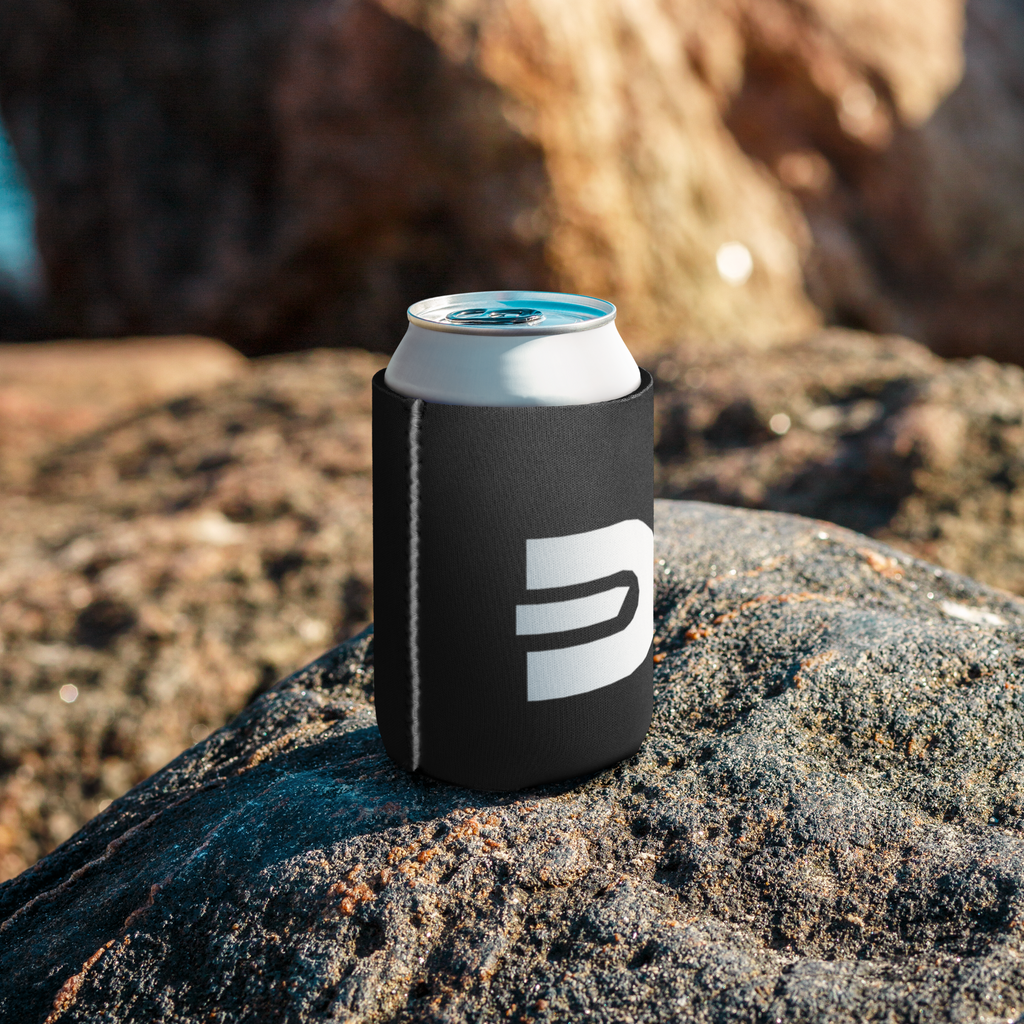 Black Dads in the Game D emblem can cooler on rocks beside water