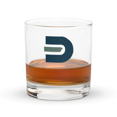 Dads in the Game D Logo rocks glass partly filled with an amber drink