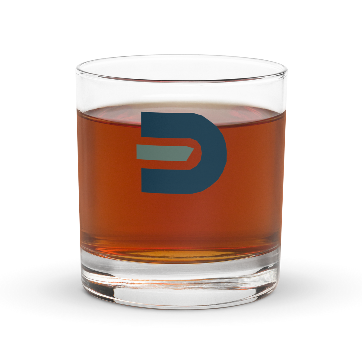 Dads in the Game D Logo rocks glass filled with an amber drink