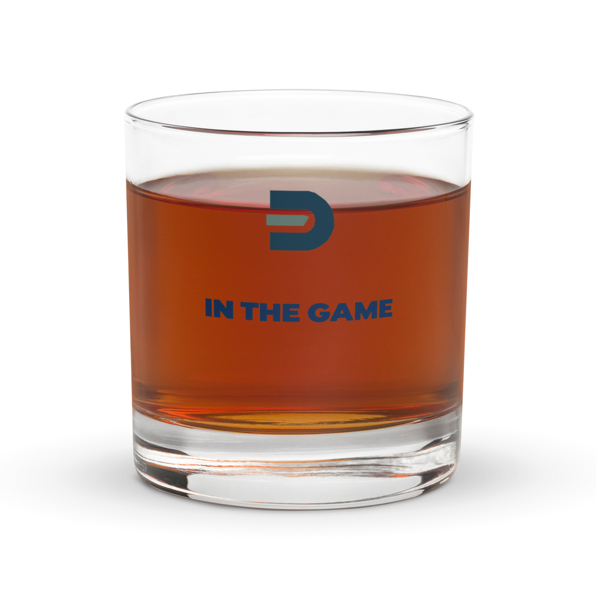 Dads in the Game rocks glass with D emblem and In the Game lettering, filled with an amber drink