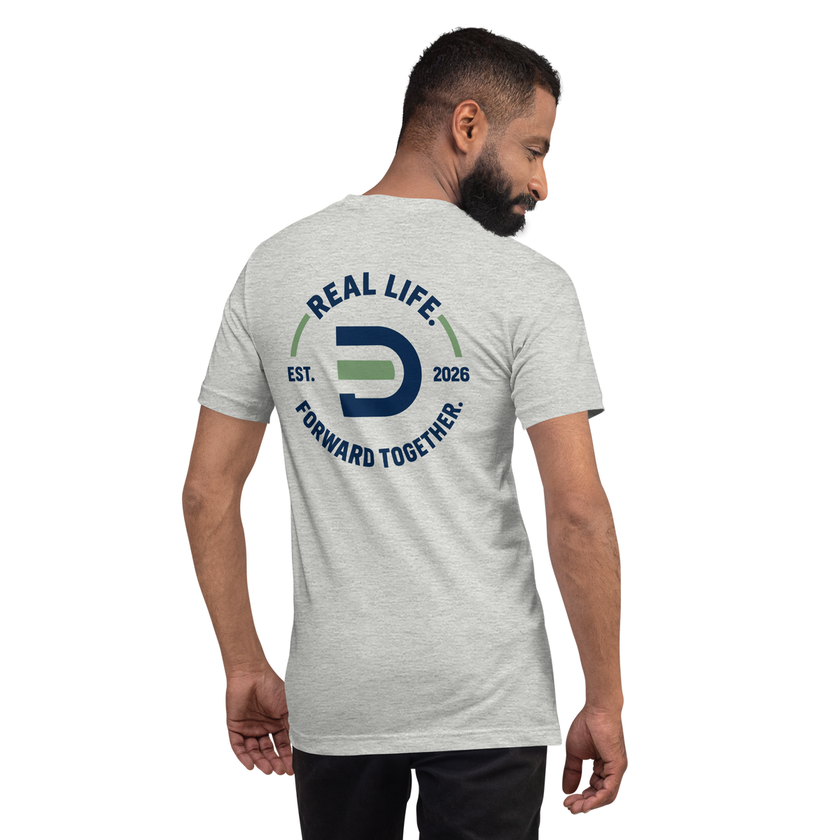 Model wearing the athletic heather Dads in the Game Real Life Wheel T-shirt, back view showing the large Real Life, Forward Together wheel design