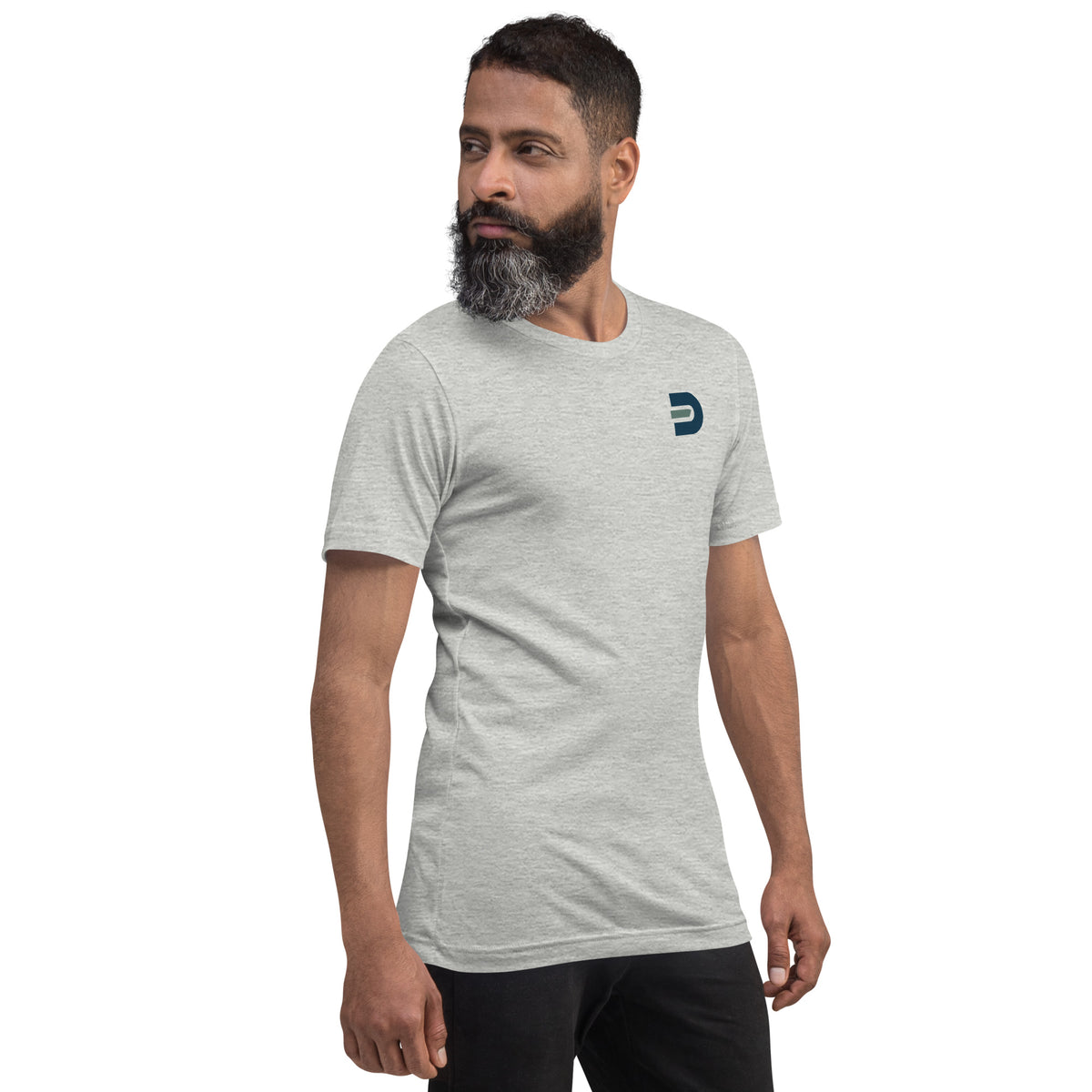 Model wearing the athletic heather Dads in the Game Signature T-shirt, angled front view with small D emblem on the left chest