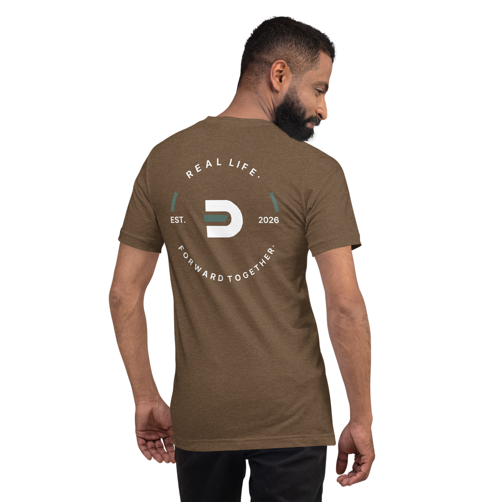 Model wearing the heather brown Dads in the Game Real Life Wheel T-shirt, back view showing the large Real Life, Forward Together wheel design