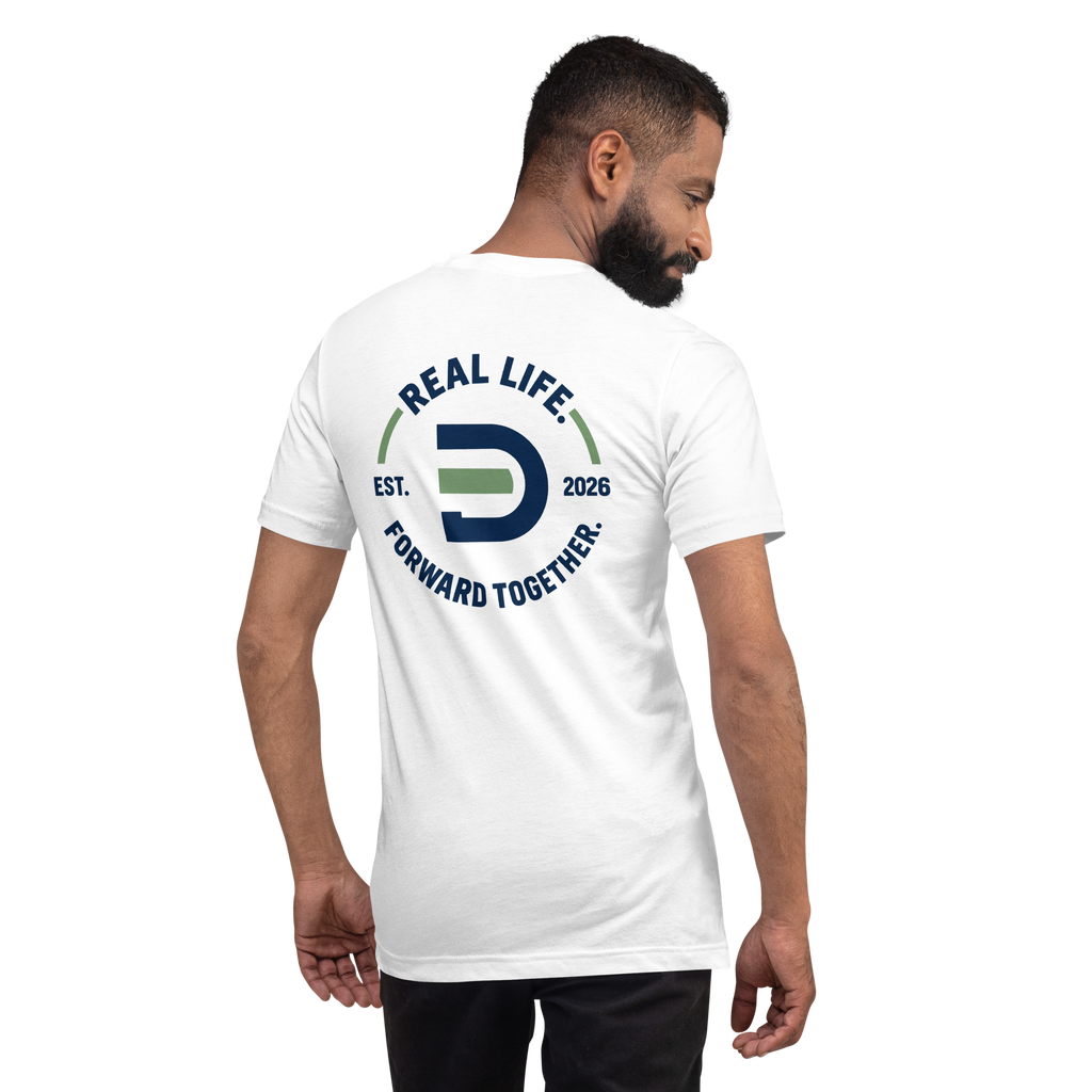 Model wearing the white Dads in the Game Real Life Wheel T-shirt, back view showing the large Real Life, Forward Together wheel design